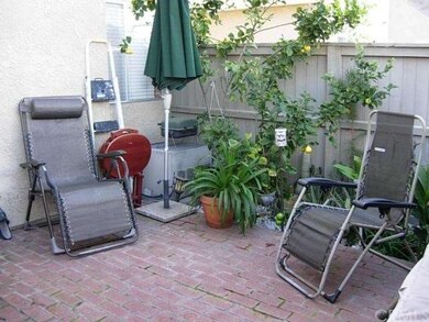 Patio has gated access to assigned carport