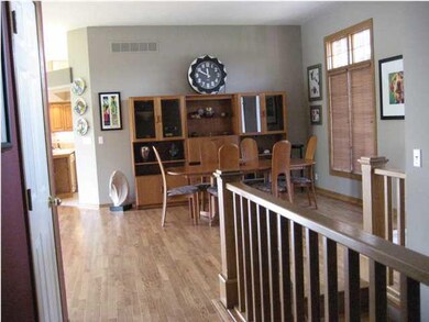 Dining room just off the living room with large wi
