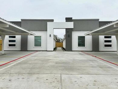 View of front of house with stucco siding
