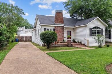 Bungalow-style home featuring a front lawn