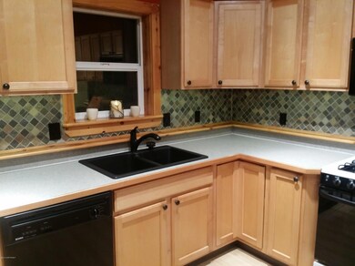 Timeless cabinets and tile back