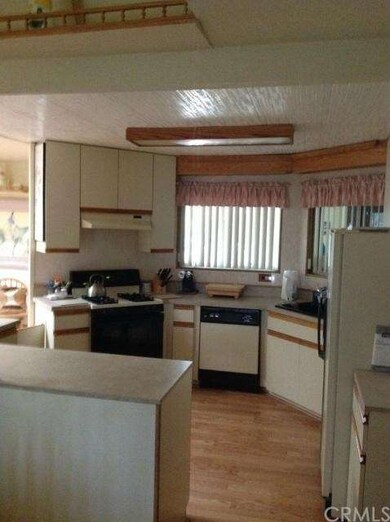 From the eat area to kitchen.