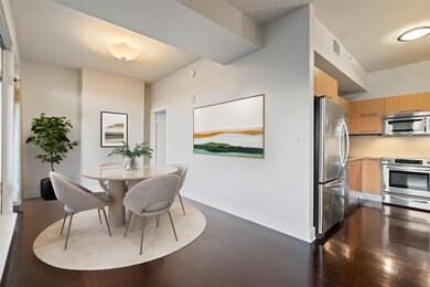 Dining area featuring baseboards and dark wood-st