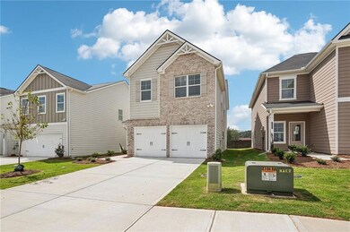 Craftsman inspired home with a front lawn, brick s