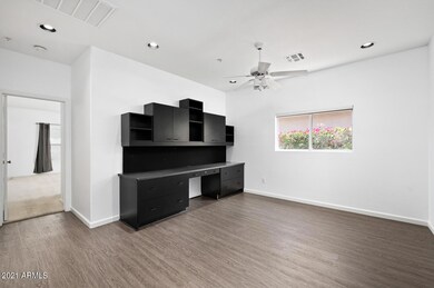 Built-in desk in den/office area