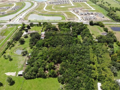 Property is mostly wooded in the back and has had some underbrushing done.  Across from the new Sterling Point subdivision.