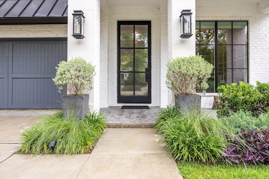 Stately Iron Entrance  With Privacy Glaze, Flanked