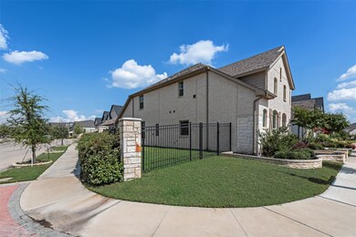 View of property exterior with stone siding