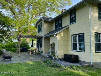 Front overlooking beautiful gardens