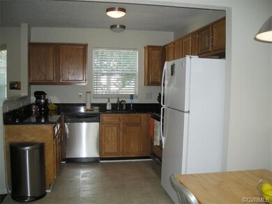 Kitchen has been recently updated with granite cou