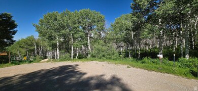 Lot view from Cul-de-sac. Southwest boundary is sign on the right.