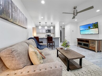 Living room looking into kitchen