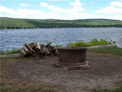 View Fire pit for evening gatherings at the water 
