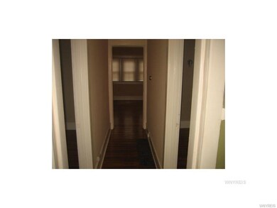 Corridor to 2 bedrooms and Living room