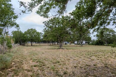 View of yard with a rural view