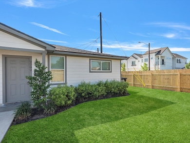 Lush landscaping maintenanced by the landlord for convenience.