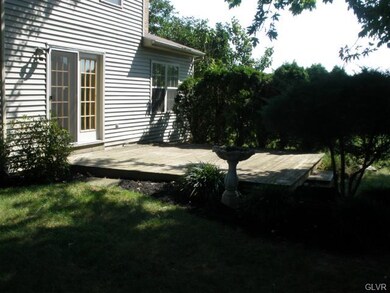 Private wood deck off of kitchen.