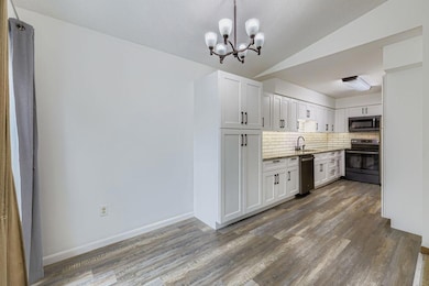 Dining Area with a second Pantry.