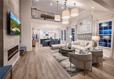Living room featuring wood-type flooring, a tile f