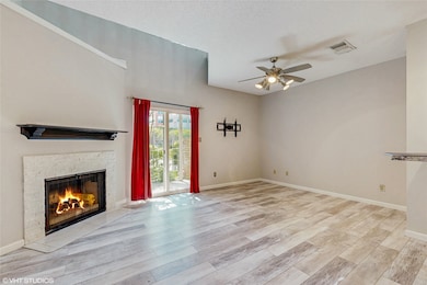 This is a charming townhouse with a brick exterior