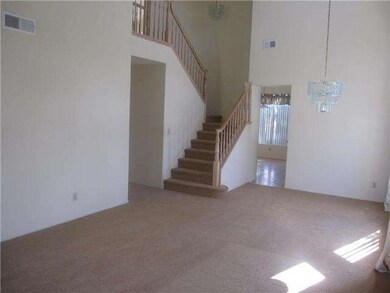 Large formal living room with vaulted ceilings