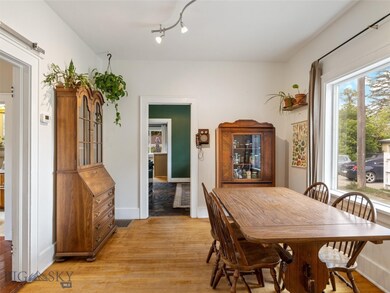 Spacious dining room with original hardwood floori