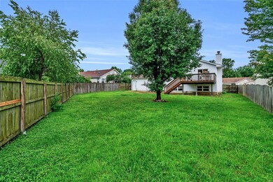 Large back yard with privacy fence