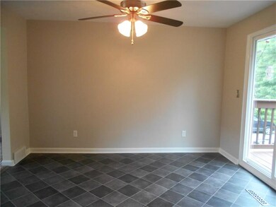 Dining area with new flooring and glass sliding do