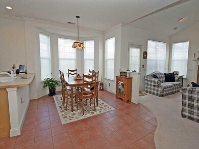 Dining Room. Dining area off of Kitchen with bay w