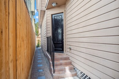 The front door is tucked away from the street and