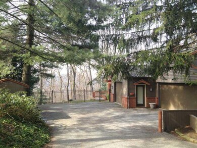 Exterior Back. The oversized two car garage is rea