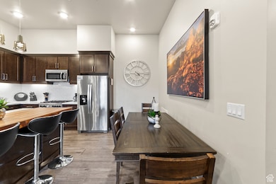 Dining space featuring light wood-style floors
