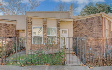Charming residential property featuring a spacious, fenced-in community pool with a patio area. Ideal for relaxation and outdoor activities in a serene neighborhood setting.