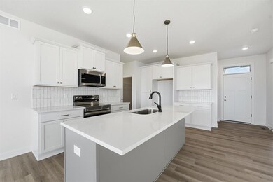 935 11th St, Waukee, IA 50263 - photo 4