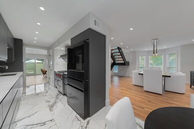 Kitchen featuring sink, designer stove, a healthy 