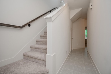 Tiled front entry foyer & upgraded carpet 2024