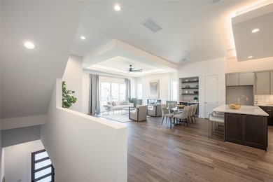 A dramatic dropdown ceiling with integrated lighti