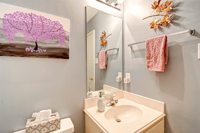 Inside the half bath just off the front entry!