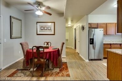 Dining room featuring wood finished floors, a ceil