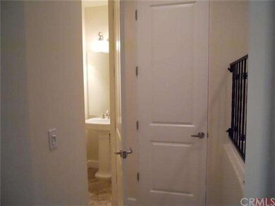Entrance to Guest bathroom on main level and door 