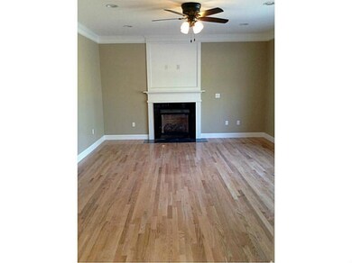 Living Room. Fireplaced family room with crown mou