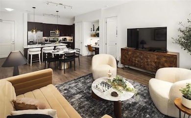 Living room featuring wood-type flooring and track