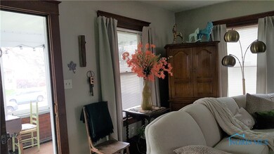 Front entry doorway from the porch to living room.