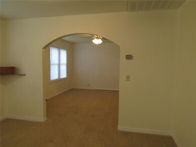 Looking from dining room into living room