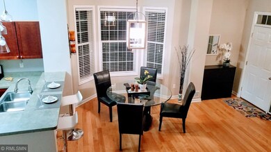Another view of the kitchen and dining