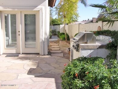 BUILT IN B-B-Q IN THE BACK YARD