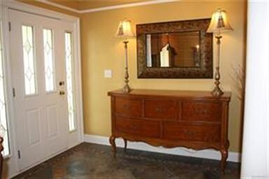 Large entryway with leaded glass sidelights!