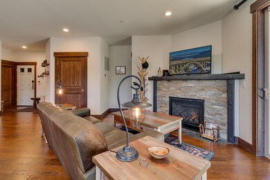 Gas Fireplace with Ledgestone Surround and Custom Metal Mantel Created by Local Truckee Blacksmith