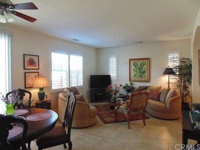 Over-sized tile flooring, plantation shutters and 