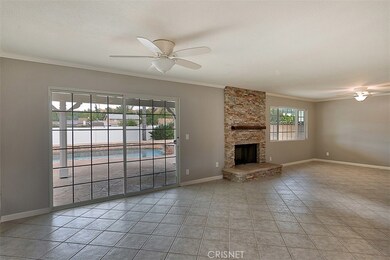 Large combination Family Room and Dining Room, with slider door to patio and backyard